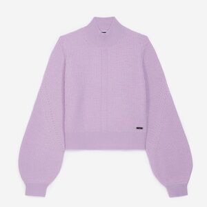 The Koople’s purple sweater